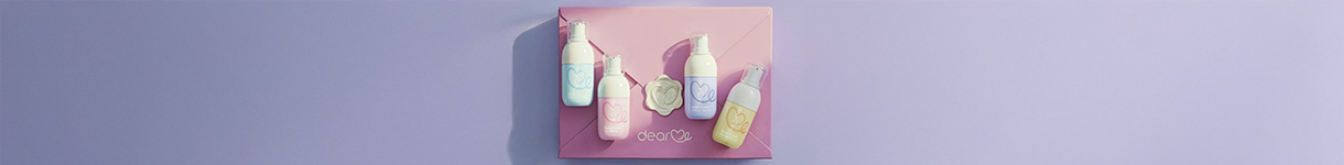 Dear Me hand cream gift set pastel skincare and fragrance set displayed on a pink envelope