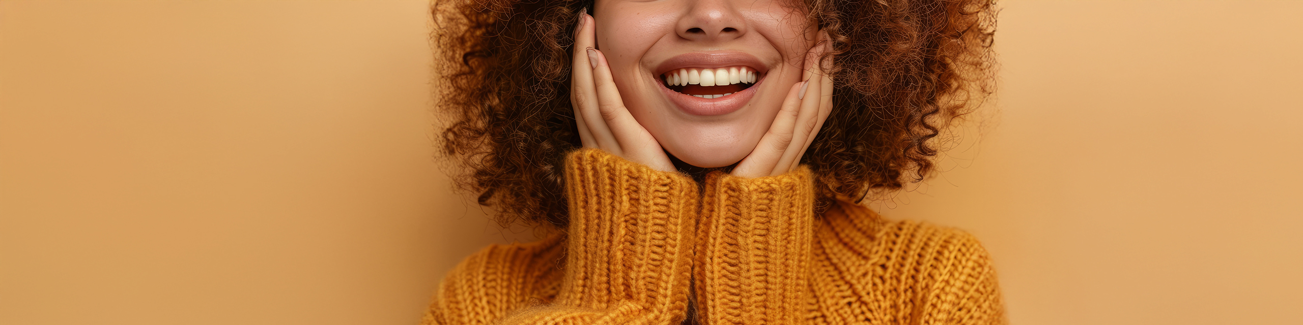 Close-up of a joyful woman in a cozy mustard sweater, symbolizing simple daily self-love rituals