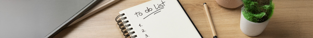 Open notebook labeled ‘To Do List’ on a tidy workspace, representing planning and intentional Sunday organization