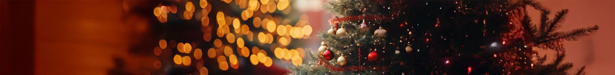 Warm Christmas tree lights and ornaments creating a cozy holiday atmosphere