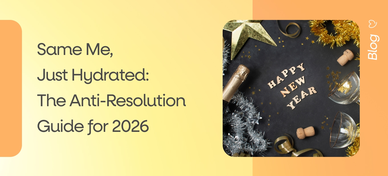 New Year’s Eve flatlay with champagne, gold decorations, tinsel, and party props on a black background for a Dear Me anti-resolution guide