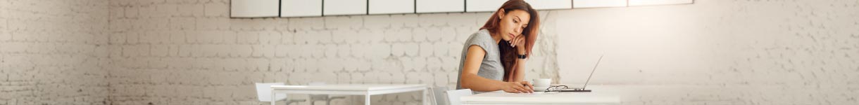 woman applying nourishing hand cream for dry hands