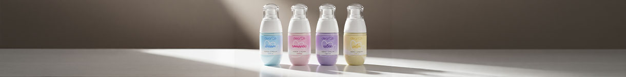 Dear Me body care collection with 4 fragrances in clean minimalist flat lay representing slow living self care ritual